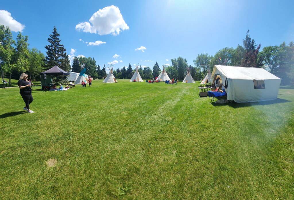 An array of teepees at National Indigenous Peoples Day 2024.